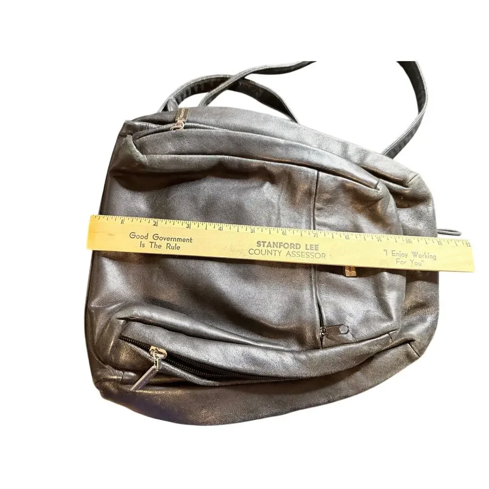 Vintage Wilson’s leather black leather mini backpack bag pockets pelle studio